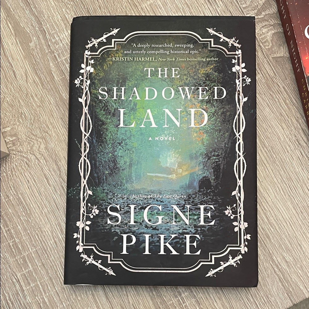 The Shadowed Land Novel by - Black Cover